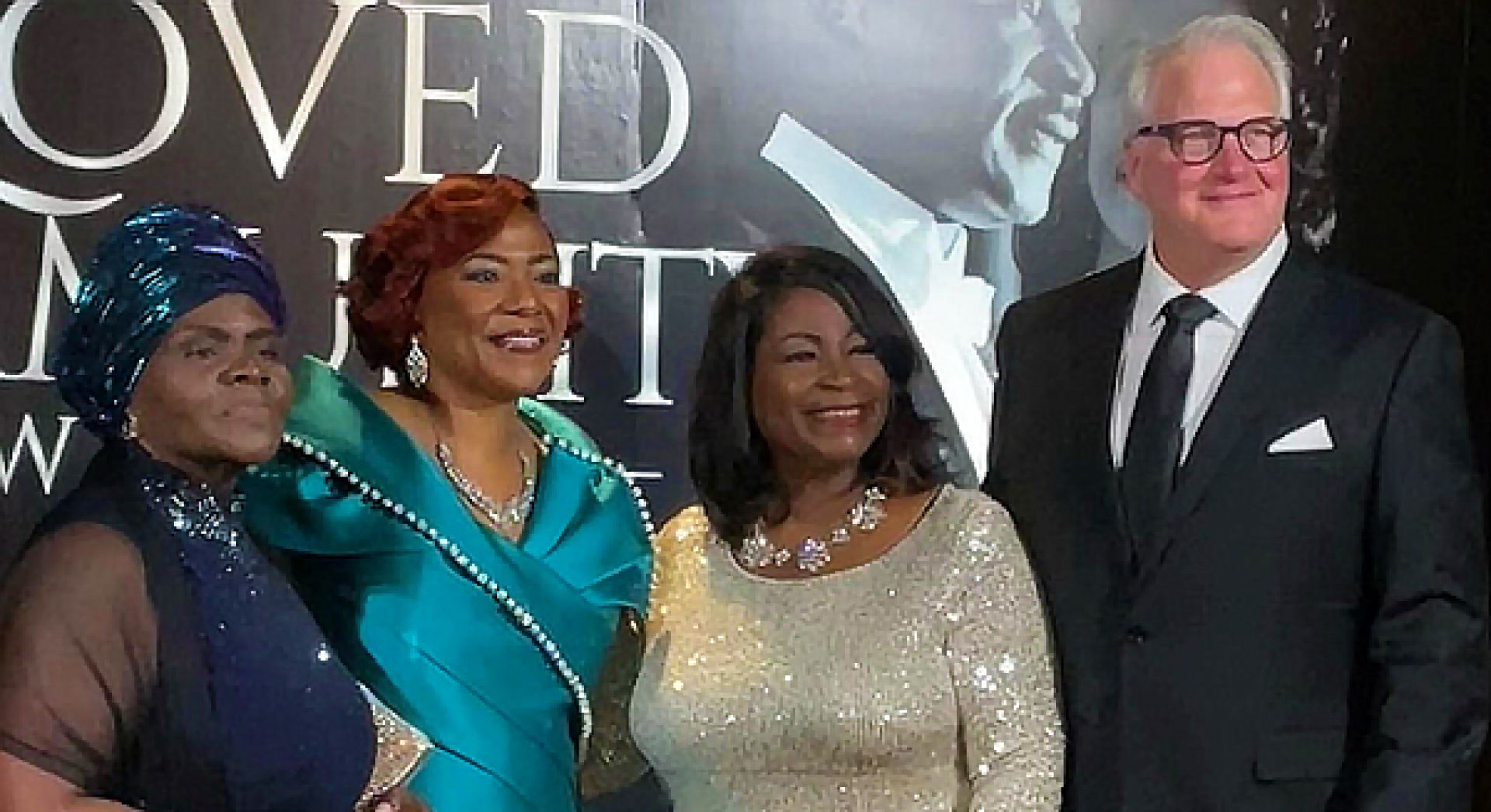 Sonia Wignall, a beneficiary (far left), Dr. Bernice King (second from left), Dr. Angela Farris Watkins (second from right), and Craig Antico (far right)